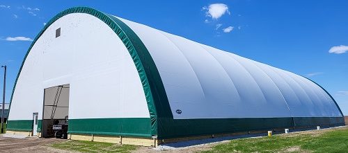 A fabric structure is seen. Greenfield Contractors build salt storage buildings in Galesburg IL.