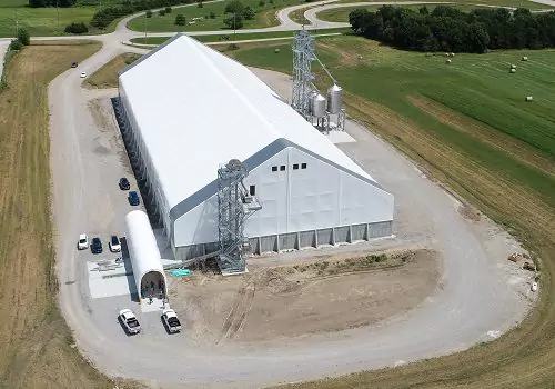 A metal building is seen on a farm. Greenfield Contractors constructs Metal Buildings in Iowa